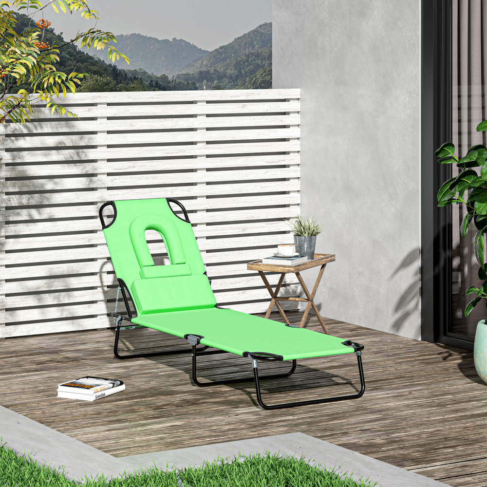Outsunny Folding Sun Lounger with Face Hole, 4-Position Adjustable Backrest Garden Recliner Chair Sunbed, Outdoor Lounge Chair with 600 D Oxford Cloth Seat, Pillow for Beach, Green